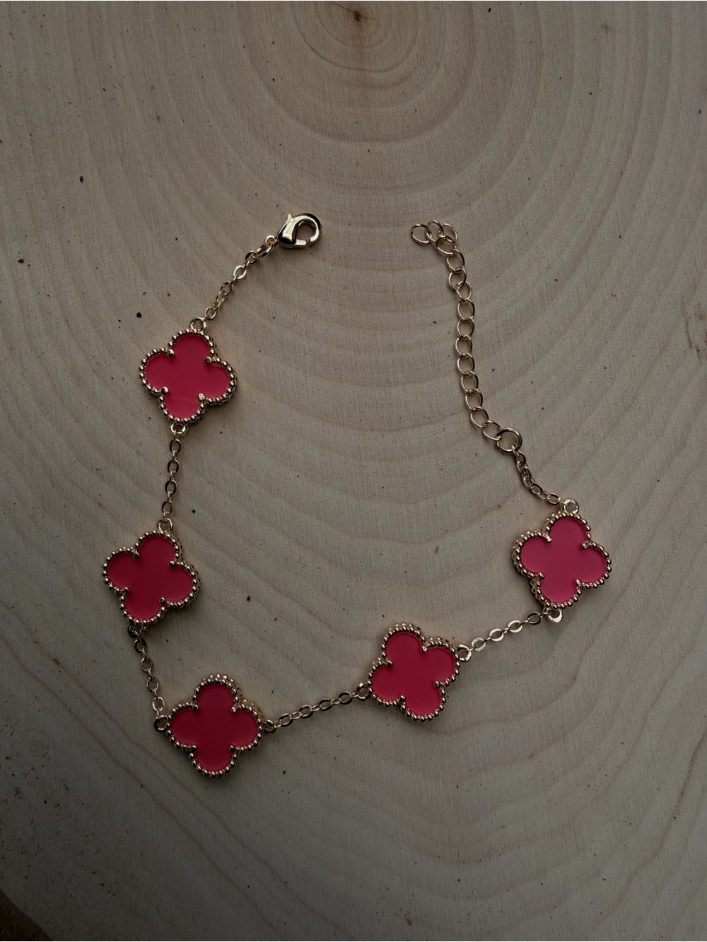 Gold-Tone Bracelet with Pink Clover Motifs